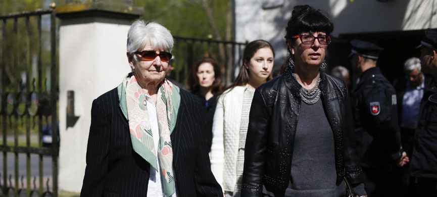 Auschwitz survivor Hedy Bohm, left, living in Toronto, Canada, and her daughter Vicky Bohm, right, leave the court hall during the noon breaks of the trial against former SS guard Oskar Groening in Lueneburg, northern Germany, Tuesday, April 21, 2015. The 93-year-old former Auschwitz guard faces trial on 300,000 counts of accessory to murder, in a case that will test the argument that anyone who served at a Nazi death camp was complicit in what happened there. (AP Photo/Markus Schreiber)