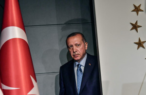 <p>TOPSHOT - Turkish President Recep Tayyip Erdogan arrives to deliver a speech on June 24, 2018 in Istanbul, after initial results of Turkey's presidential and parliamentary elections. Erdogan on June 24 declared victory in a tightly-contested presidential election, extending his 15-year grip on power in the face of a revitalised opposition. Turkish voters had for the first time cast ballots for both president and parliament in the snap polls, with Erdogan looking for a first round knockout and an overall majority for his ruling Justice and Development Party (AKP). / AFP PHOTO / BULENT KILICBULENT KILIC/AFP/Getty Images</p>