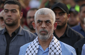 <p>Head of the political wing of the Palestinian Hamas movement in the Gaza Strip Yahya Sinwar attends a rally in support of Jerusalem's al-Aqsa mosque in Gaza City on October 1, 2022. (Photo by MAHMUD HAMS / AFP)</p>