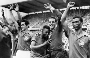 <p>Brazil's 17- year-old star Pele, center, weeps on the shoulder of goalkeeper Gilmar Dos Santos Neves after Brazil's 5-2 victory over Sweden in the final of the World Cup tournament in Stockholm. (l-r) Garrincha, Orlando, Pele, Gilmar and Didi.</p>