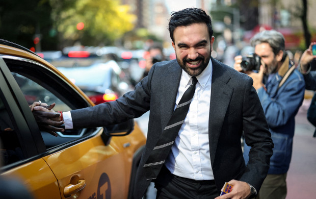 <p>Democratic candidate for New York City Mayor, Zohran Mamdani, shakes the hand of a cab driver while campaigning in Manhattan's Upper East Side neighborhood during early voting, in New York City, U.S., October 27, 2025. REUTERS/Mike Segar TPX IMAGES OF THE DAY</p>