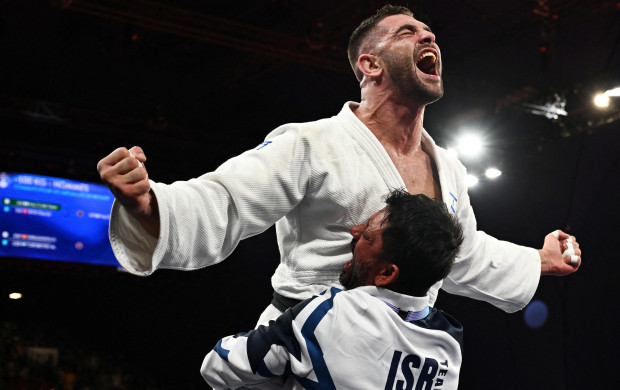 <p>Paris 2024 Olympics - Judo - Men -100 kg Contest for Bronze Medal A - Champ de Mars Arena, Paris, France - August 01, 2024. Peter Paltchik of Israel reacts after winning his bout against Daniel Eich of Switzerland. REUTERS/Arlette Bashizi TPX IMAGES OF THE DAY</p>