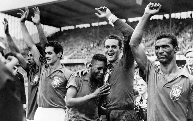 <p>Brazil's 17- year-old star Pele, center, weeps on the shoulder of goalkeeper Gilmar Dos Santos Neves after Brazil's 5-2 victory over Sweden in the final of the World Cup tournament in Stockholm. (l-r) Garrincha, Orlando, Pele, Gilmar and Didi.</p>