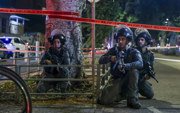 <p>Israeli police take position after a shooting in Jaffa, a mixed Arab-Jewish area of Tel Aviv, Israel, Tuesday, Oct. 1, 2024. (AP Photo/Itai Ron)</p>