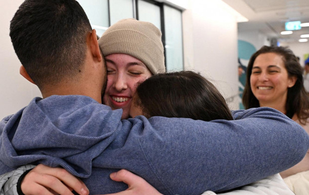 <p>Released Israeli hostage, Naama Levy, a soldier who was seized from her army base in southern Israel during the deadly October 7 2023 attack by Hamas, is reunited with loved ones after being released from captivity, at Beilinson Schneider complex in Petah Tikva, Israel, in a handout photo obtained by Reuters on January 25, 2025. Haim Zach/Government Press Office/Handout via REUTERS THIS IMAGE HAS BEEN SUPPLIED BY A THIRD PARTY</p>