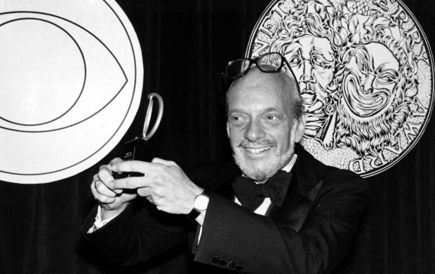 <p>Harold Prince poses with his Tony Award for best direction of a musical in 1980. He earned the honor for his work on <em>Evita.</em></p>