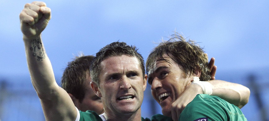 <p>Republic of Ireland's Robbie Keane, reacts with Kevin Kilbane, right, after Kilbane scored a goal against Andorra during their Euro 2012 Group B qualifying soccer match in Dublin, Ireland, Tuesday, Sept. 7, 2010. (AP Photo/Peter Morrison)</p>