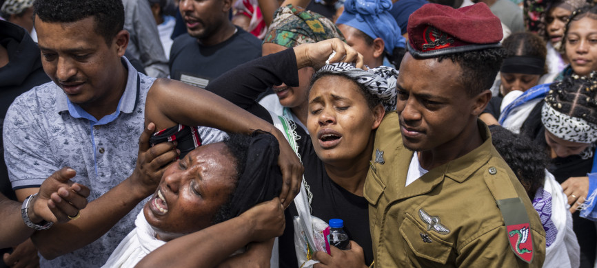 <p>Family of Israeli solider Sergeant Yosef Dassa mourns in grief during his funeral in Kiryat Ata, Israel, Sunday, May 12, 2024. Dassa ,19, was killed during Israel's ground operation in the Gaza Strip, where the Israeli army has been battling Palestinian militants in the war ignited by Hamas' Oct. 7 attack into Israel. (AP Photo/Ariel Schalit)</p>